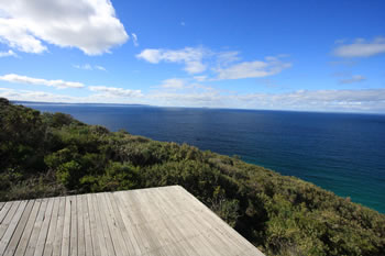 Hang Glider preparing to launch from Shelley Beach platforms